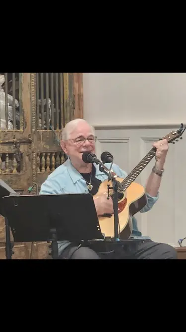 Dave Miller performing at ornate church venue